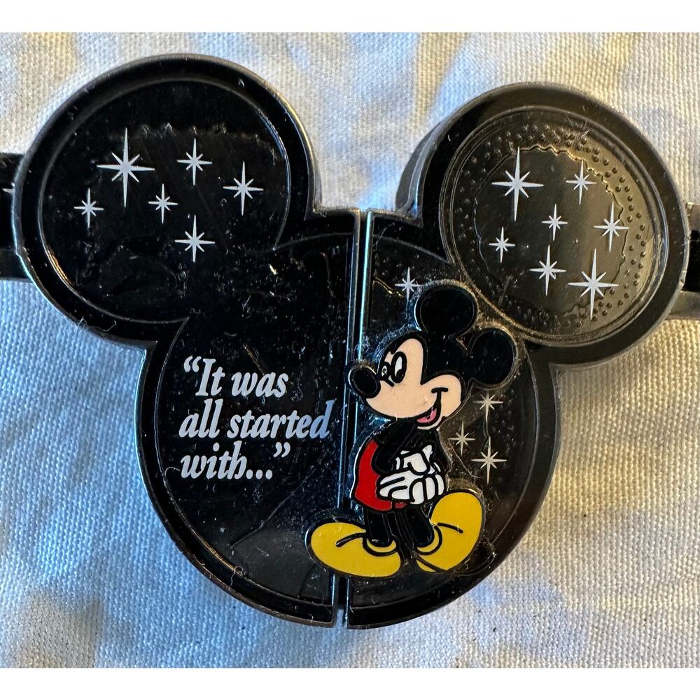 It was all started my a mouse Mickey tri-fold Pin